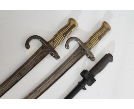 THREE FRENCH BAYONETS, comprising one m1886 Lebel bayonet with scabbard and two m1866 bayonets, longest 27 1/2" (Est. plus 21