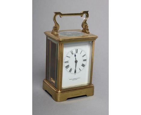 A BRASS CASED CARRIAGE CLOCK, 20th century, the single barrel movement with platform escapement, the backplate stamped "R. & 
