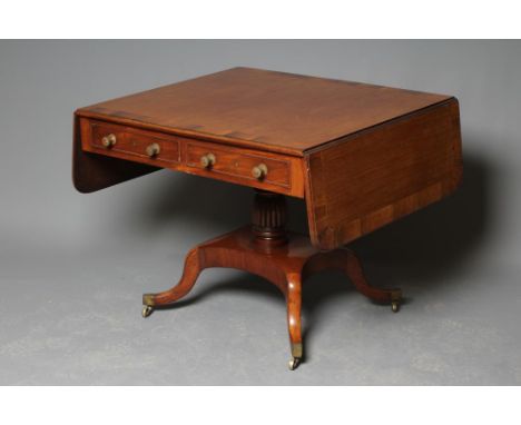 A GEORGE IV MAHOGANY AND ROSEWOOD BANDED SOFA TABLE, early 19th century, the moulded edged rounded oblong top over frieze wit