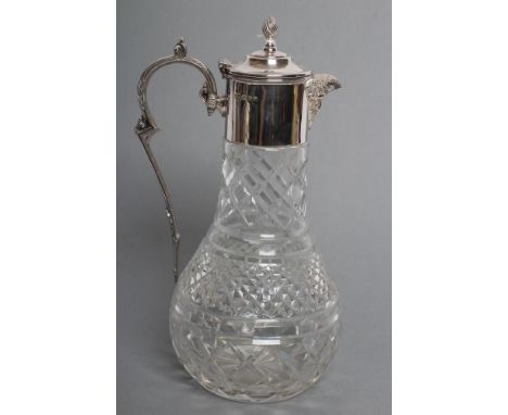 A SILVER MOUNTED CLEAR GLASS CLARET JUG, maker David Shaw Silverware Ltd., London 1978, the diamond and slice moulded baluste