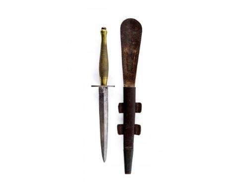 A FAIRBAIRN & SYKES FIGHTING KNIFE, the 6 1/4" blade etched with maker's mark for Wilkinson and "THE F&S FIGHTING KNIFE" to o