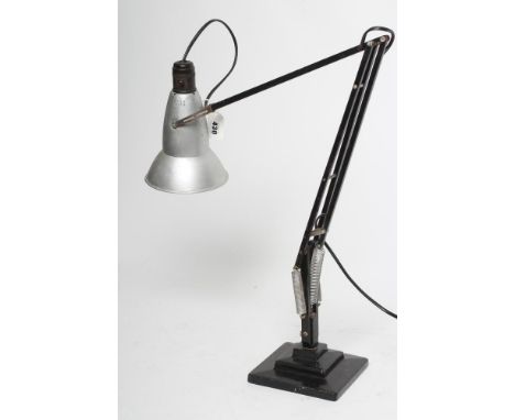 A BLACK ANGLE POISE DESK LAMP, 1930's, the metal alloy shade with Crabtree bakelite fitting, on stepped square base, 37" at h