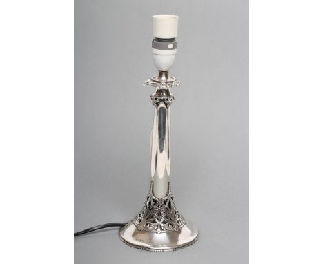 A SILVER ELECTRIC TABLE LAMP BASE, maker Mappin & Webb, Birmingham 1930, of inverted trumpet form with pierced and engraved f