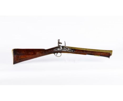 A FLINTLOCK BLUNDERBUSS BY WILKINSON, late 18th century, the 13 3/4" brass barrel with proof marks and inscribed "LONDON" wit