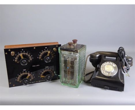 A Vintage Philip Harris Ltd., Birmingham England Electrical Unit. The unit showing OHMS 18 degrees C on the front, four "stat