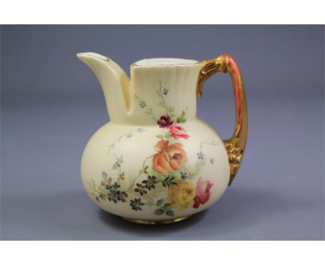 A Royal Worcester Hand Painted Jug. The jug of unusual shape is hand painted with a floral spray, puce factory mark numbered 