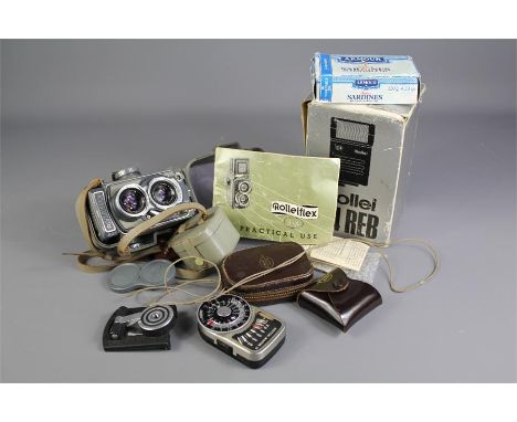 A Vintage Rolleiflex 4x4 Grey Camera. The camera with Schneider Xenar f/3.5 60 mm lens, serial nr 2050680,  this lot includes