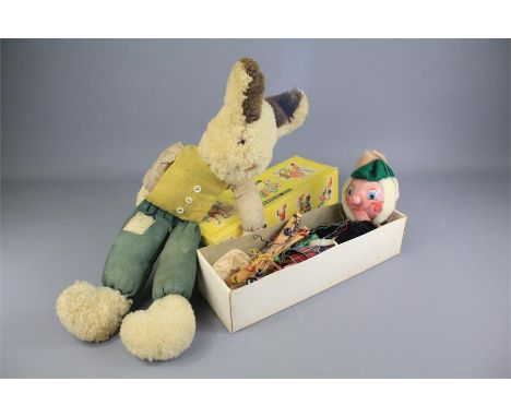 A Vintage Pelham Puppet 'MacBoozle'. The puppet dressed in Scottish attire and in original box, together with a vintage rag R
