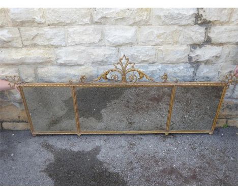 A Continental Gilt Wrought Iron Mirror, approx 170 x 80 cms, with foliate scroll appointments.