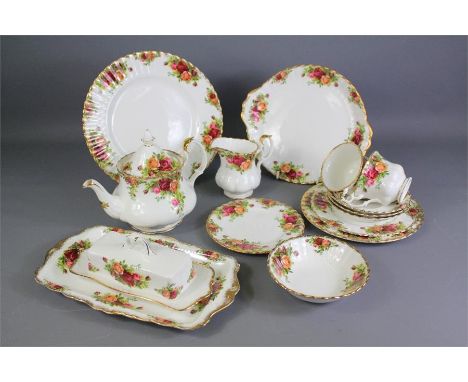 A Country Roses Tea and Dinner Service. The dinner service comprises six dinner plates, six fish plates, six side plates, twe