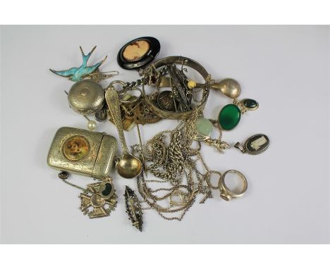 A Quantity of Silver and Silver-Metal Jewellery. This lot contains a silver-metal vesta, lighter, chains and rings etc.