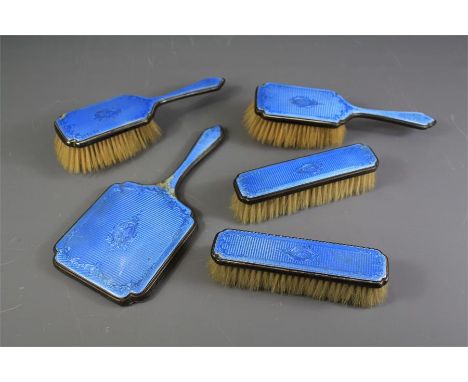 A Blue Enamel and Silver Brush Set. The set comprising two hair brushes, two clothes brushes and one hand mirror (wf). (5)