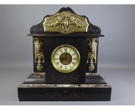 A.H. Smith, Cavan Slate and Black Marble Mantle Clock. The clock having an enamel face and Roman dial with French movement, a