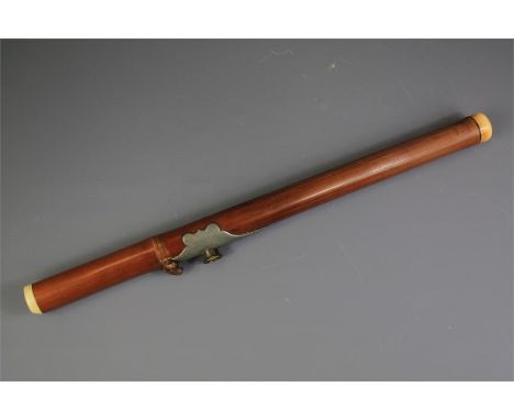 A 19th Century Chinese Bamboo Opium Pipe. The bamboo pipe made from a single section of bamboo with ivory mouth piece and hor