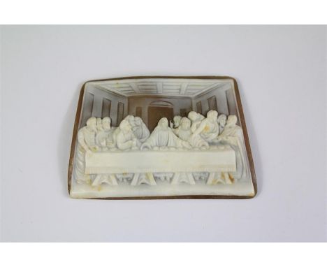 A Vintage Shell Cameo. The cameo carved in relief depicting 'The Last Supper', approx 6 x 4 cms.