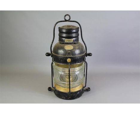 Griffiths &amp; Sons Black Enamel and Brass Ship's Lantern. The lantern being of cylindrical design with ribbed glass. The br