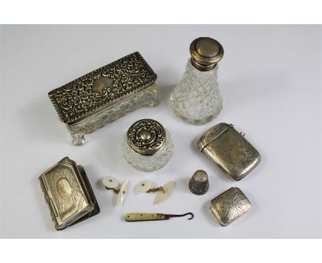 Miscellaneous Silver. This lot includes a silver vesta stamped 925, silver top trinket box, scent bottle, pill box, silver- p