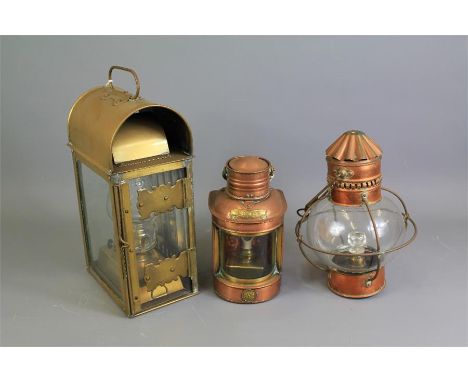 A Brass Ship's Lantern. The lantern being of domed design with plain glass fronts, approx 33 x 18 cms together with two coppe