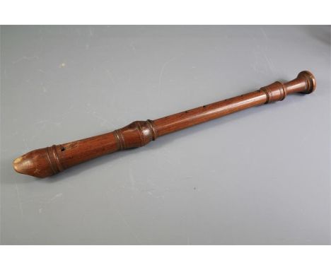 A Vintage Wood Carved Tenor Recorder. The recorder approx 49 cms in length.&nbsp;