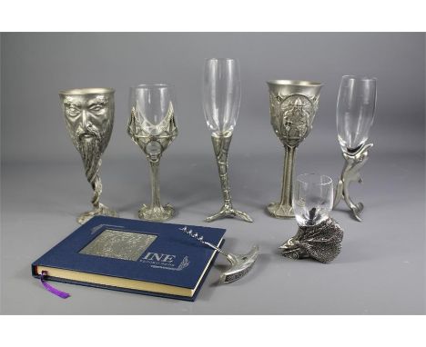 A Quantity of Royal Selangor Pewter. This lot includes spirit measure, wine filter, wine goblet supports, two book labels, si