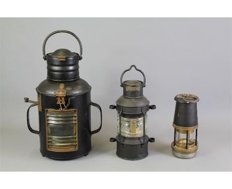 A Black Enamel D &amp; L Ship's Lantern. The lantern being of cylindrical design with ribbed glass front approx 37 cms togeth