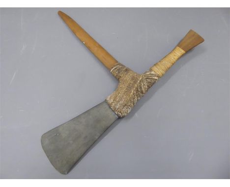 A Papua New Guinea Stone, Wood and Rattan Axe. The blade being approx 19 cms in length.