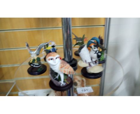 SHELF OF READER'S DIGEST BIRD ORNAMENTS