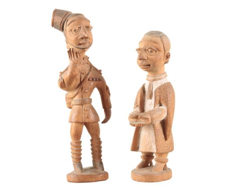 THOMAS ONA ODULATE (1900-1952), Nigeria early 20th century, two Yoruba Nigerian satirical wood sculptures with applied pigmen