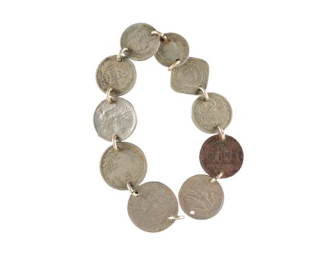 A WORLD WAR I COIN BRACELETwith ten white metal coins (of various denominations including some from Italy, France, Germany, a