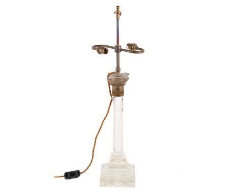 A 20th century fine glass table lamp. With a tapered hexagonal column, Corinthian-style cast brass capital and stepped square