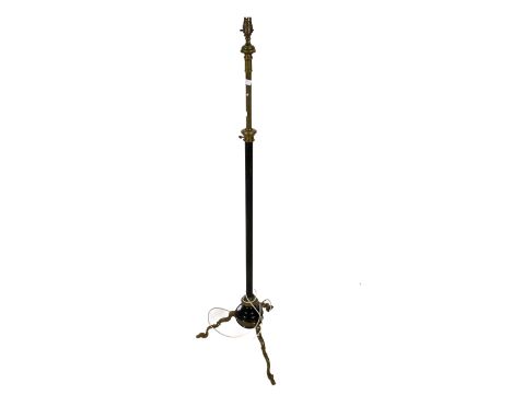 A brass and metal standard lamp. Adjustable height, without shade. 