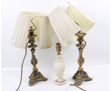 Pair of 20th century cast brass table lamp bases and one other. Of ornate candlestick design with tri-form base H30cm plus a 