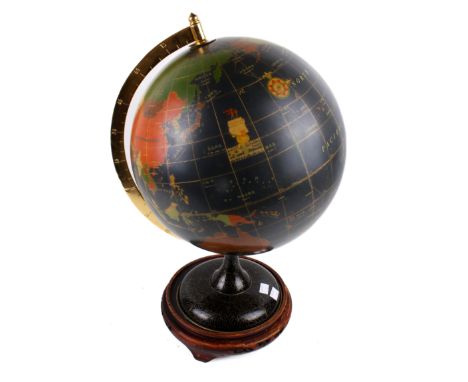 A Chinese made terrestrial globe with enamel base. H50cm, comes with a hardwood stand.