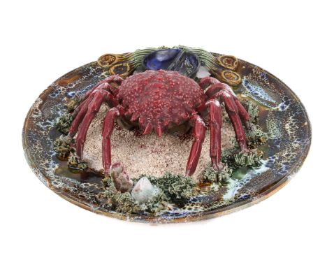 A 'Palissy' majolica style wall plate with a red crab and other sea creatures. Diameter 33cm