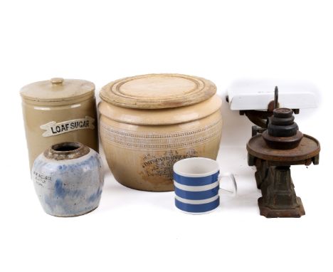 A collection of Kitchenalia. Including a Doulton Lambeth stoneware bread bin,a set of Avery scales and sugar cutters etc. 