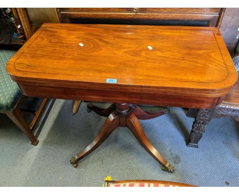 A Regency mahogany foldover card table with a green baize and four splayed legs, 72h x 91w 