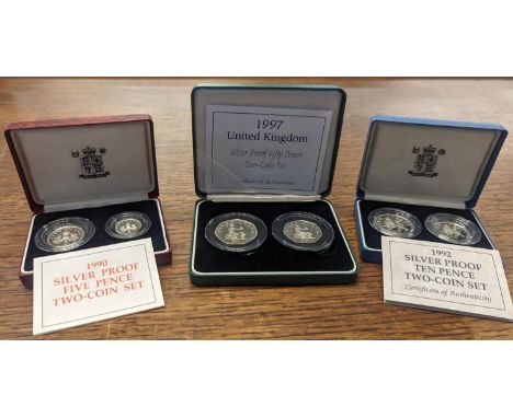 A group of three Royal Mint silver proof sets 1990, five pence two coins set, 1992 ten pence two coins set and the 1997 fifty