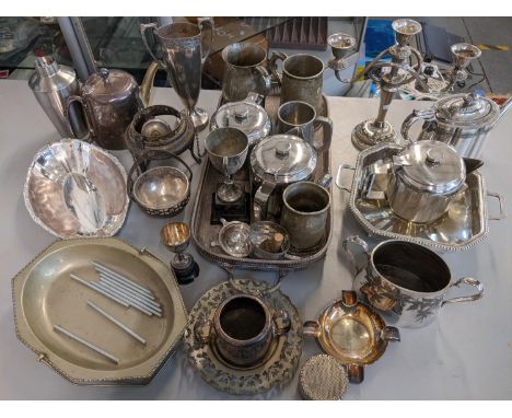 Mixed silver plate to include a three branch candlestick, tea pot, twin handled tray and other itemsLocation: 