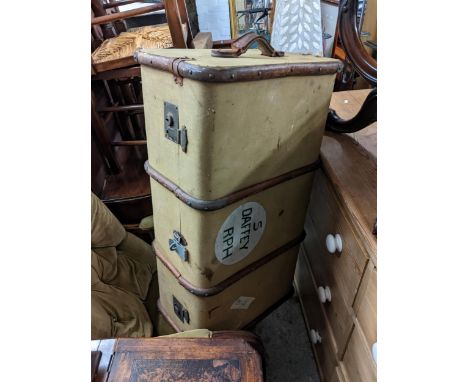 A vintage twin handled suitcaseLocation: G