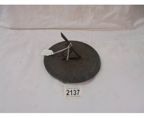 An old brass sundial.
