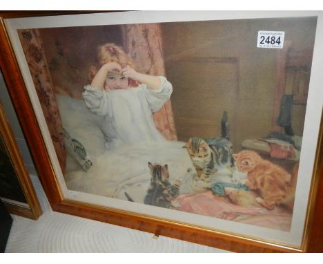 A framed and glazed Pears style print of young girl with kittens.