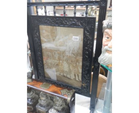 An ebonised embroidered fire screen. COLLECT ONLY.