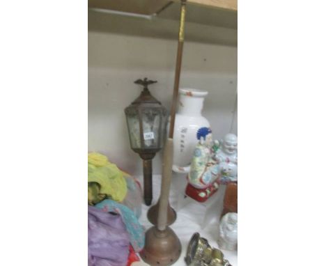 A brass coach lamp, a copper post horn and a copper washing dolly. COLLECT ONLY.
