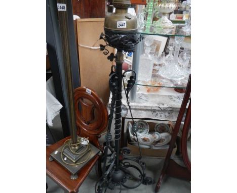 A Victorian brass and iron standard oil lamp. COLLECT ONLY.