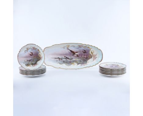 Thirteen (13) Piece Limoges Hand painted Porcelain Fish Set. Includes: platter 23-3/4" L, 12 plates 9-1/4" Dia.. Signed. Typi