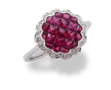 Approx. 1.74 Carat Invisible Set Ruby, Pave Set Diamond and 18 Karat White Gold Ring. Rubies with vivid color. Stamped 750. V