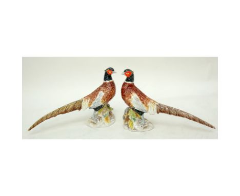 Pair of Mid Century Italian Hand painted Ceramic Pheasants. Signed Italy and numbered to base. Normal scuffs to base from dis