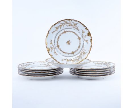 Twelve (12) Limoges For Ovington Brothers Gold Decorated Porcelain Plates. Signed. One with small edge flake, all with light 