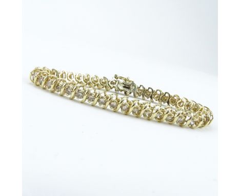 Vintage Approx. 5.0 Carat Round Brilliant Cut Diamond and 14 Karat Yellow Gold Tennis Bracelet. Diamonds K-L-M color, SI1-SI3