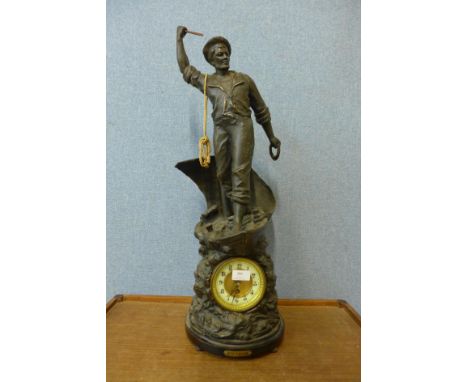 A large 19th Century spelter figural mantel clock, titled Cod Fishing, 75cms h 